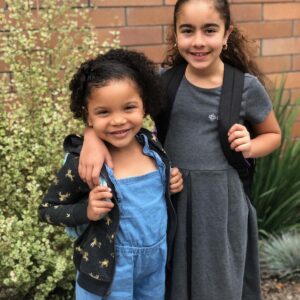 Maris and her little sister before their first day of school