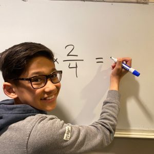 A child solving a math problem