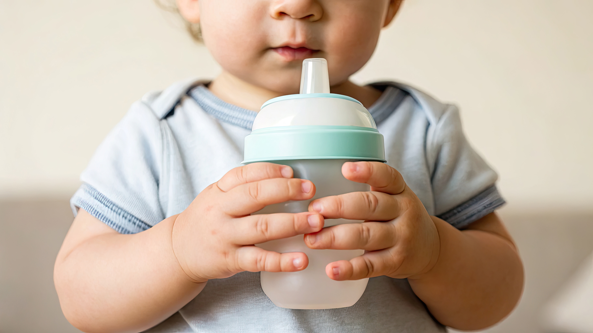 Baby with a sippy cup